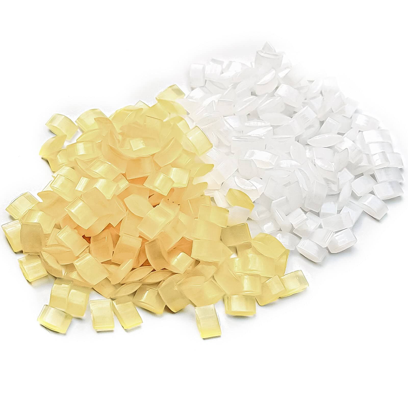 Bundles of clear hot melt adhesive sticks stacked together, showcasing glossy surfaces and consistent cylindrical shape.